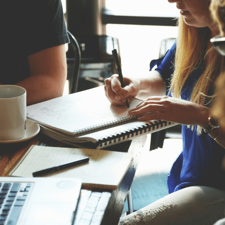 People with notebook