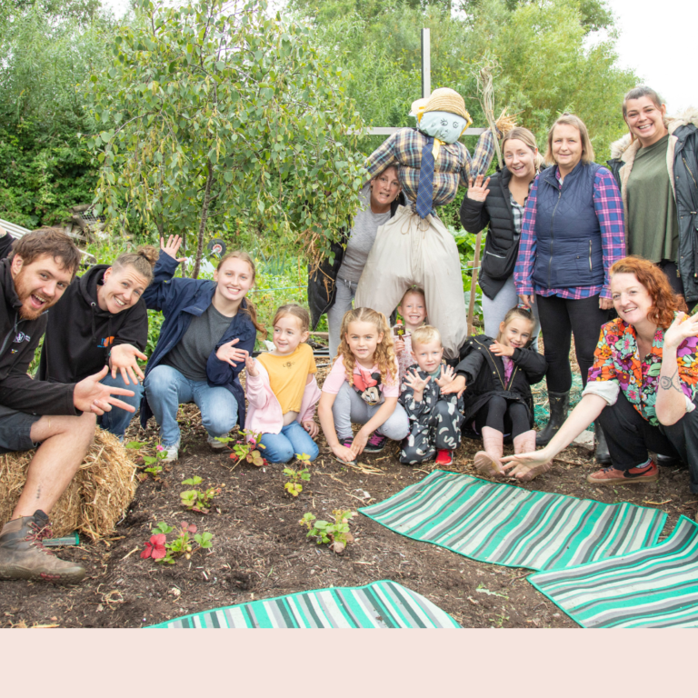 A group of people at community allotment at Ambition Lawrence Weston