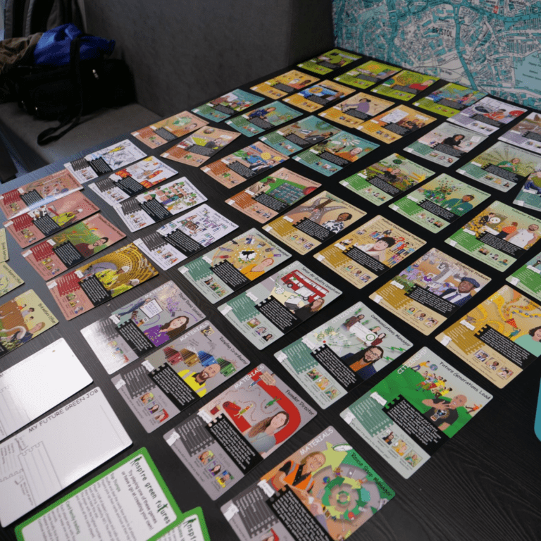 A selection of green jobs cards on a table