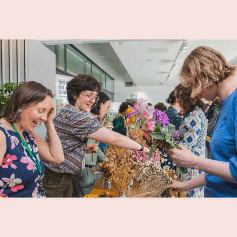 Photo of people arranging flowers